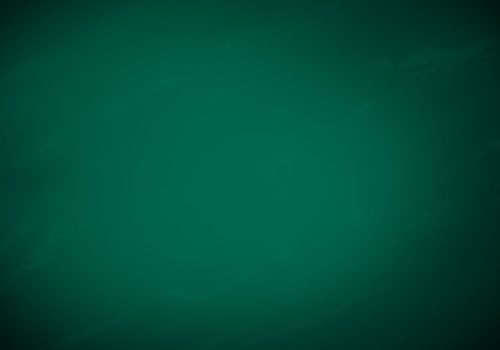 Chalkboard or blackboard green texture. Empty blank with copy space for chalk text. Used feel with chalk traces and great texture